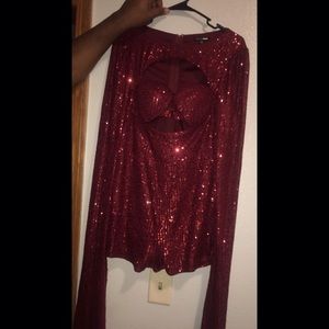 Beautiful wine red romper with cut princess sleeves.